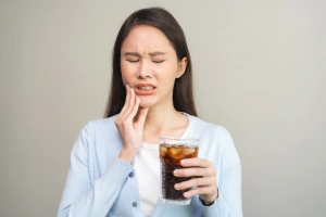 Dentist consulting with patient