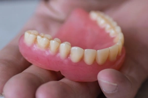 Dentist consulting with patient