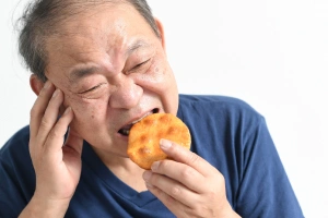 Man drinking hot beverage