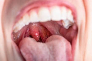 Man drinking hot beverage