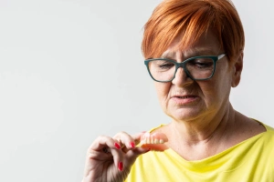 Dentist consulting with patient