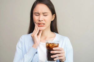 Man drinking hot beverage