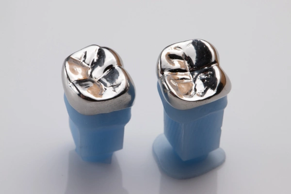 Man holding cheek in pain