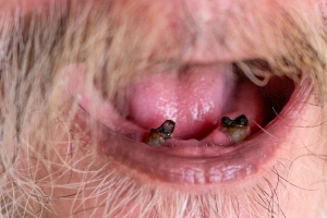 Man drinking hot beverage